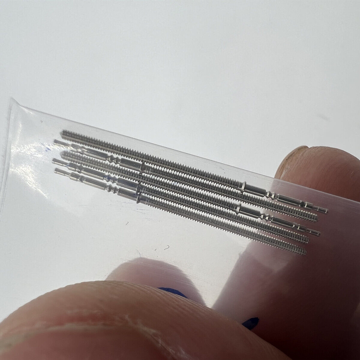 Replacement winding stem for PE70 PE90 PE50 watch movements, precise fit for quality timepieces.