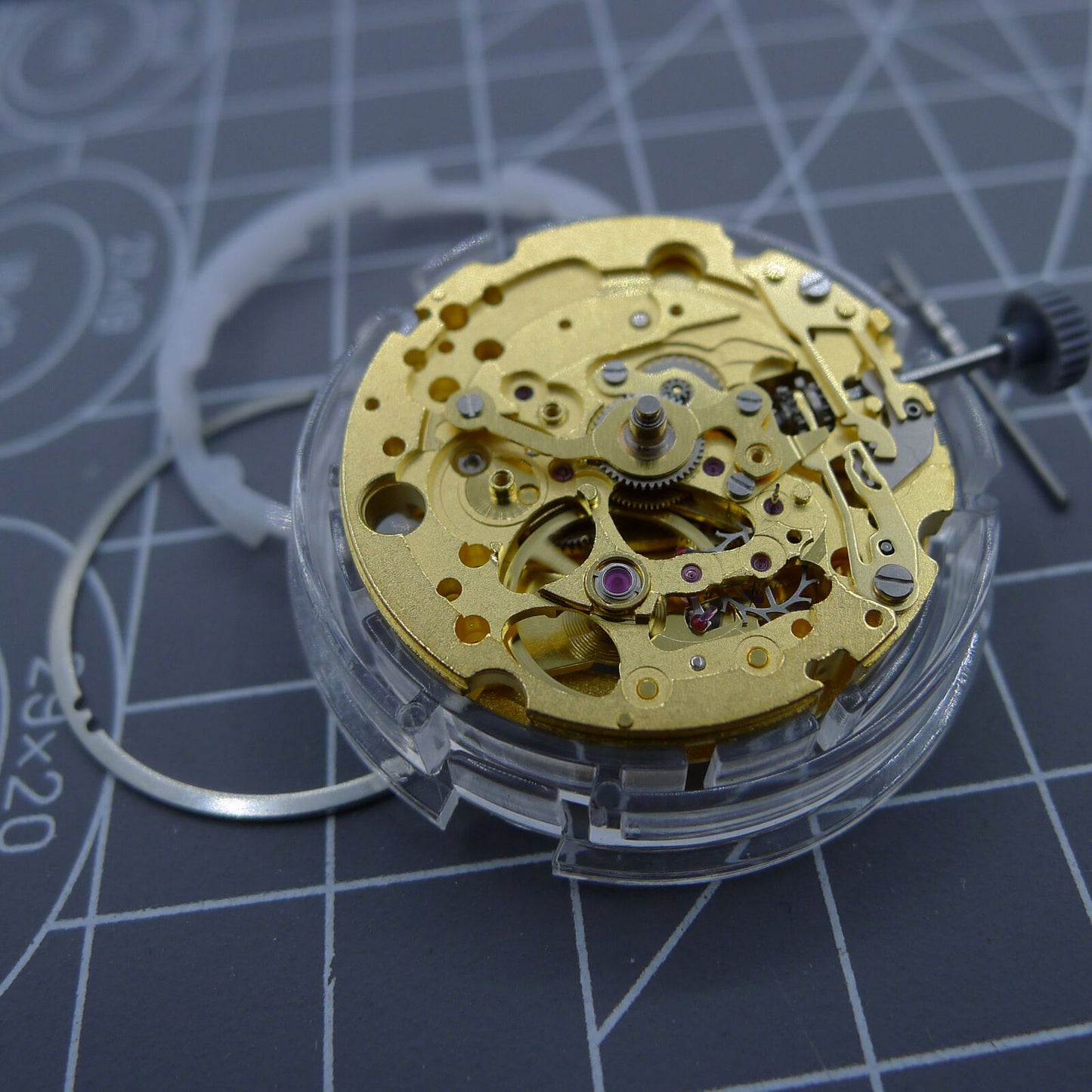 Gold-tone Miyota (CITIZEN) 82S0 mechanical watch movement displaying automatic precision engineering.
