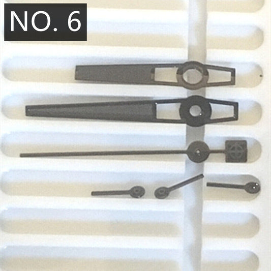 Black trim lume watch hands for Ronda 5030.D quartz movement, enhancing visibility and style.