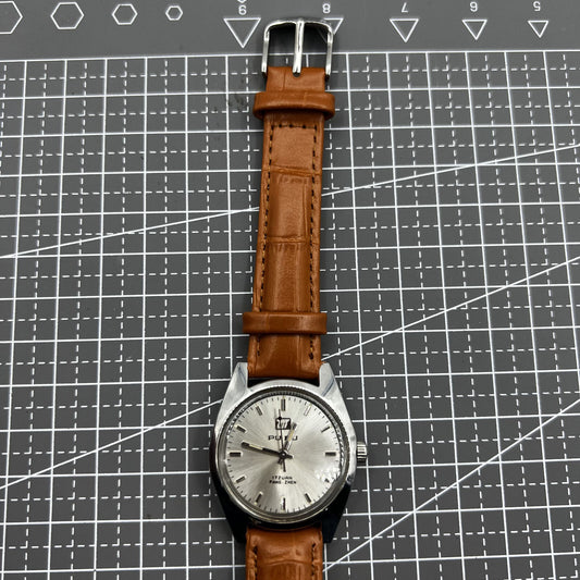 PUBU 32mm manual mechanical watch with grey dial and nail markers, 17 jewels, precision craftsmanship.