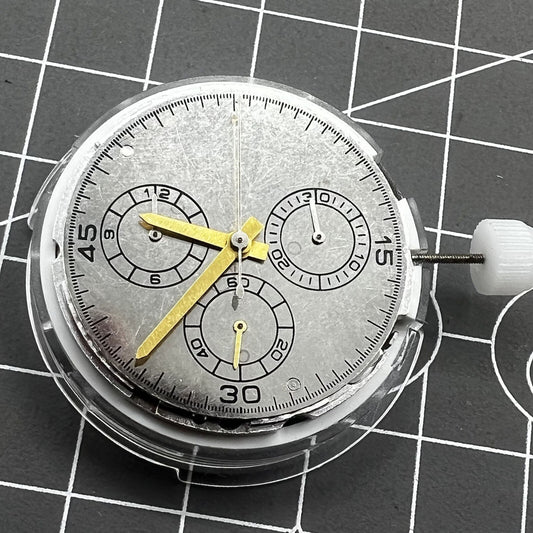 Chinese 4130 automatic watch movement displaying small seconds at 3, 6, and 9 o'clock positions.