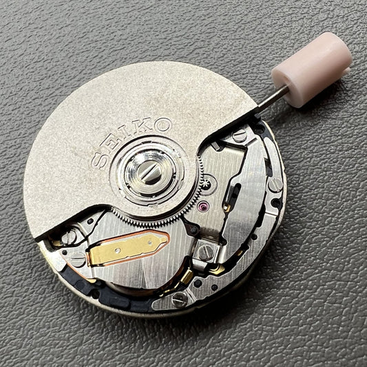 Seiko 5J32A quartz watch movement with black disk and single calendar display for accurate timekeeping