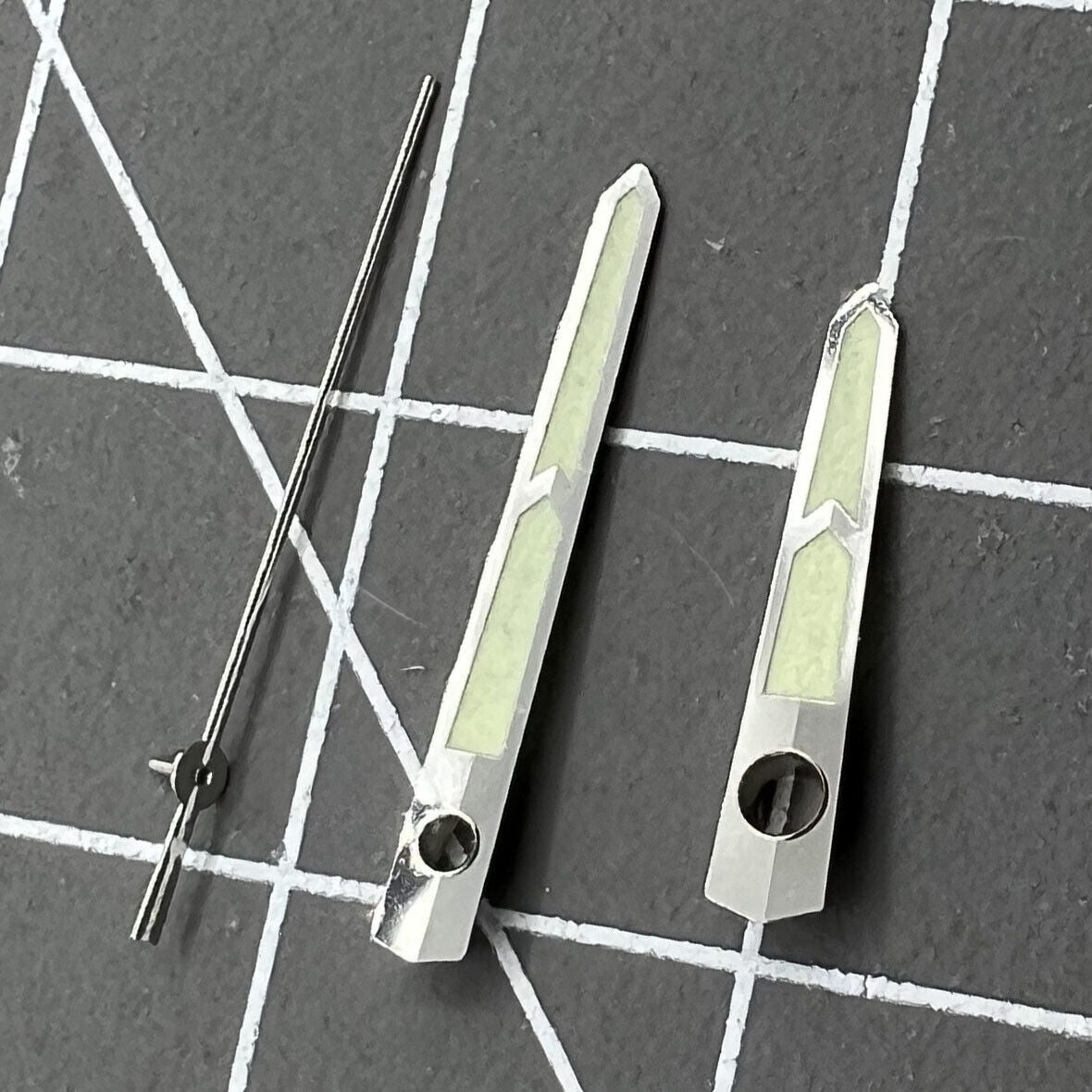Green luminous watch hands compatible with China Made 8215/2813/Miyota 8N24 movements for enhanced visibility.