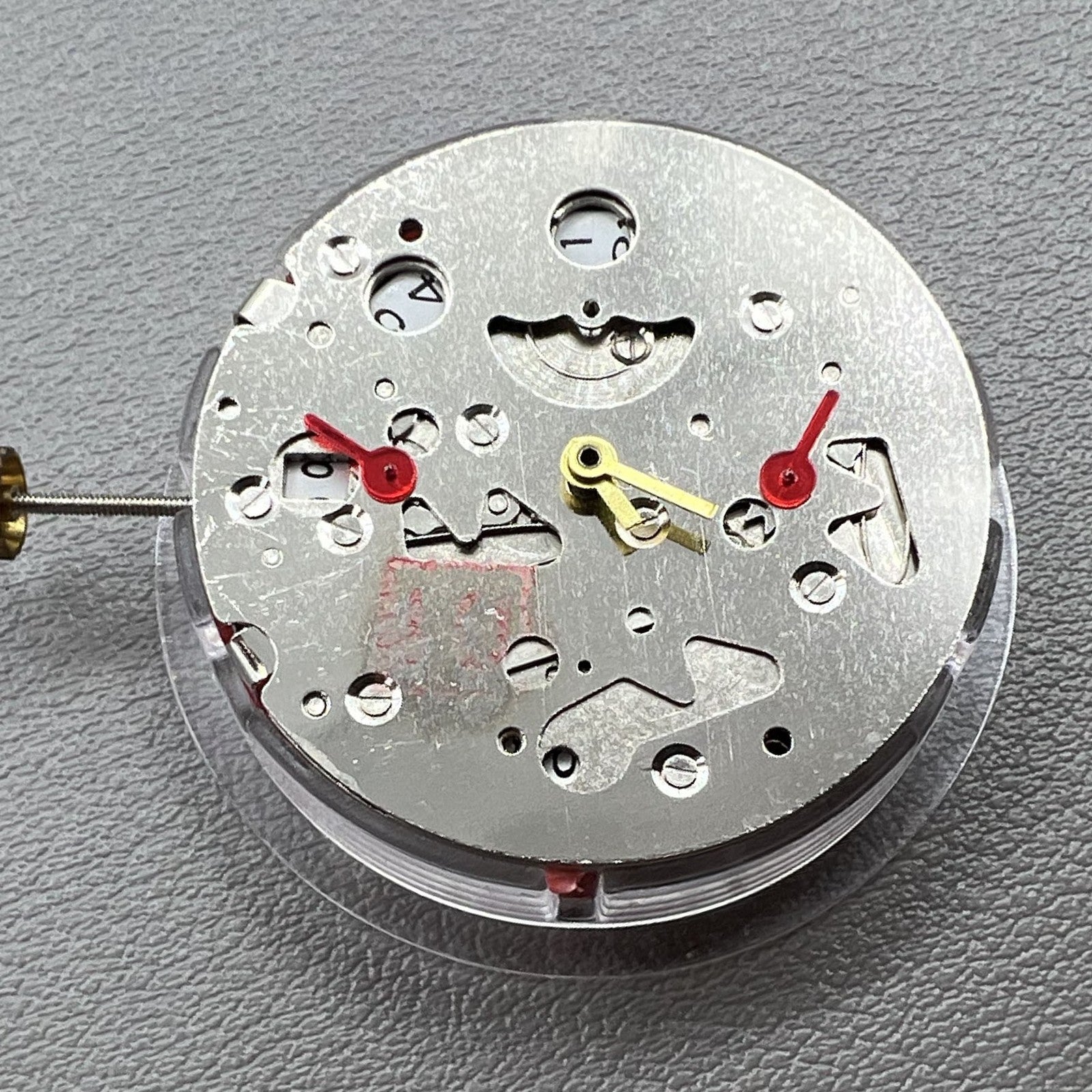 China Made 7120 watch with mechanical movement, second hands at 3/6/9, date display, sleek design by China Made.