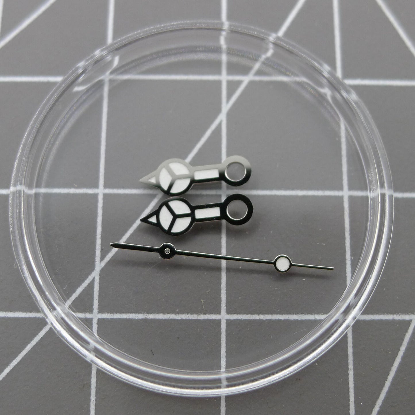 Silver trim green luminous watch hands designed for NH35A/NH36A movement, enhancing readability and style.