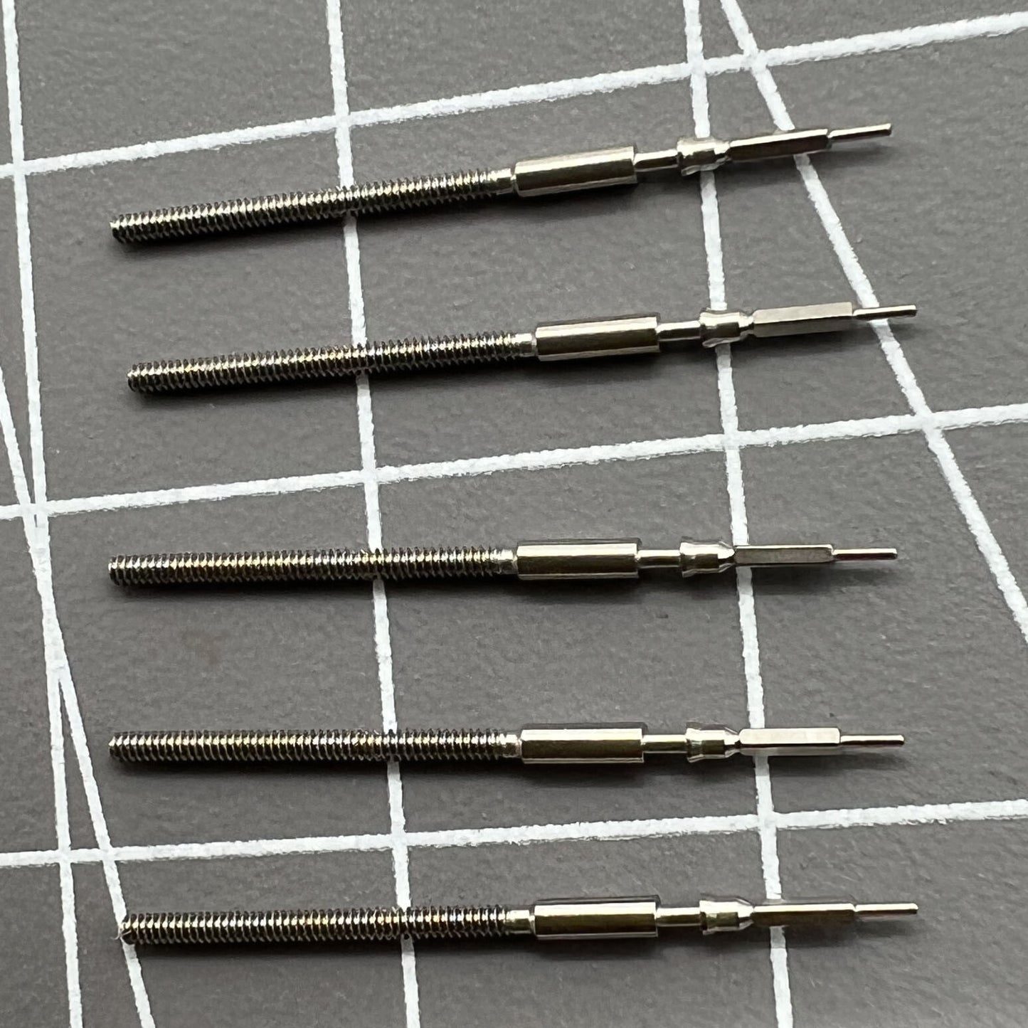 Set of 5 watch winding stems for Miyota 9015 movement, compatible with multiple watch models.