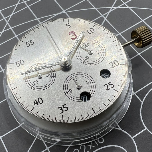 Dandong 7750 black watch accessory with mechanical movement and date display at 6 o'clock slot.