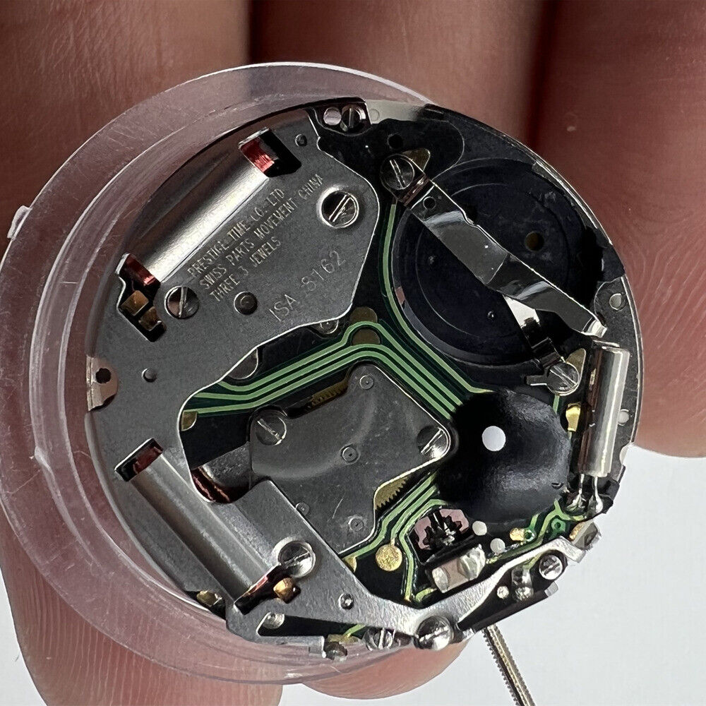 Swiss ISA 8162 quartz watch movement with date at 6, precise replacement for watch repairs by ISA brand.