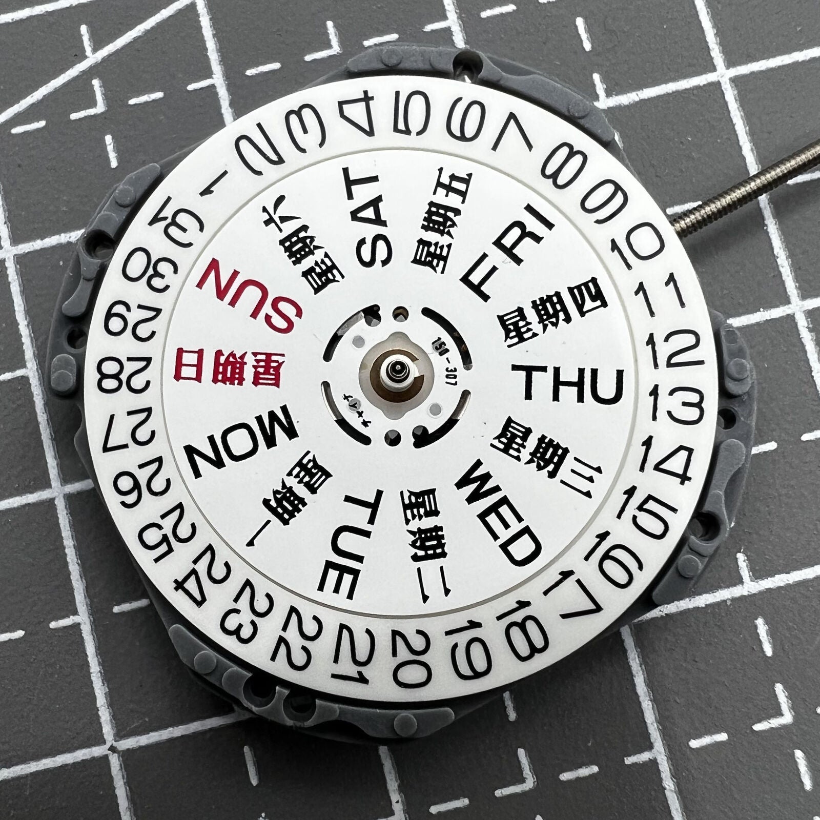 Hattori Epson VJ43 quartz watch movement with date/day in English and Chinese for precise timekeeping