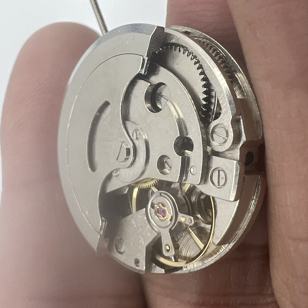 26.5mm 7120 automatic mechanical watch movement with single calendar and three hands, precise and reliable.