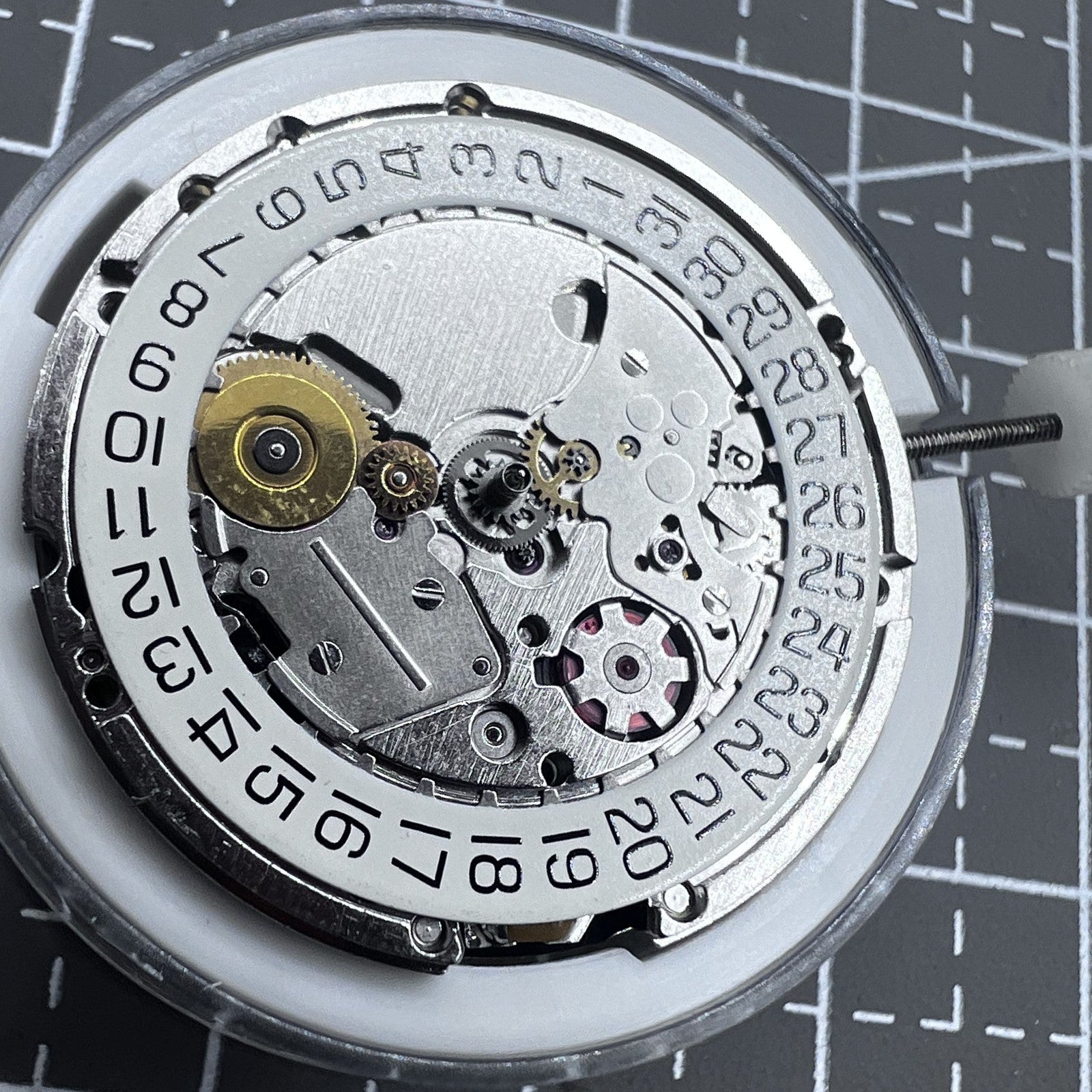Swiss Silver ETA 205.111 kinetic watch movement component for accurate watch repair and maintenance.