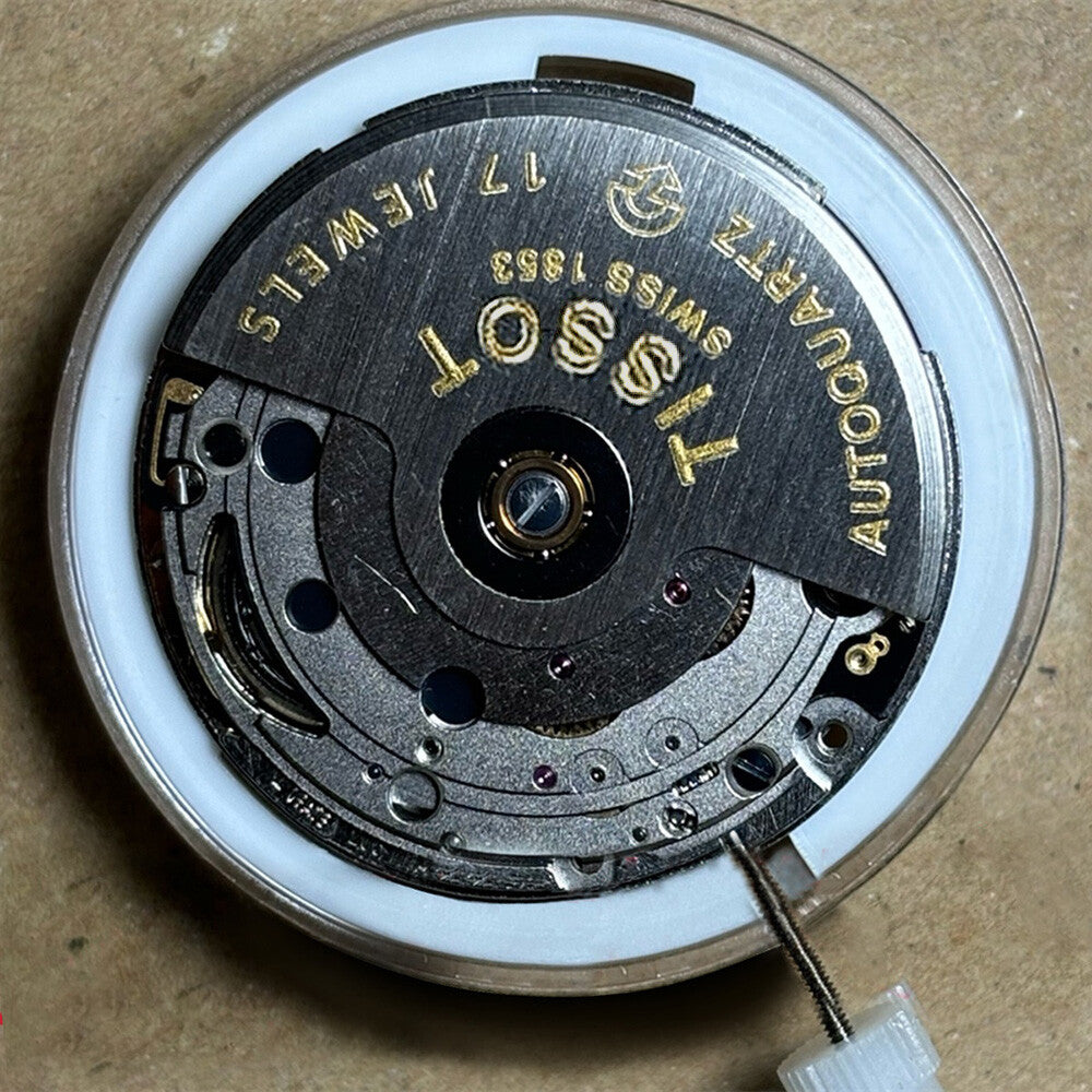 Swiss Made Silver ETA 205.111 watch movement for kinetic energy watches, precise timekeeping by ETA.