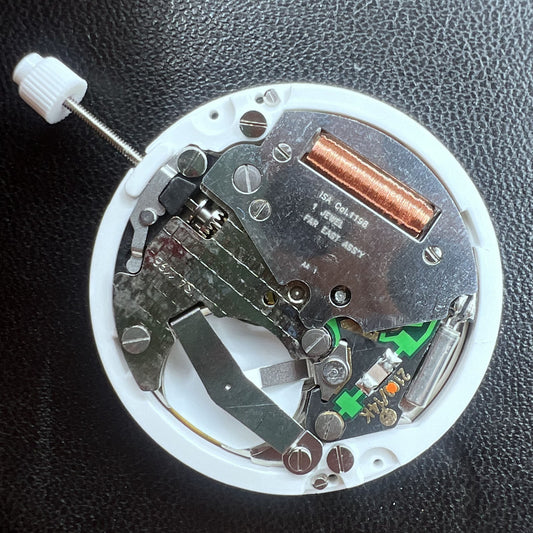 Swiss ISA 1198 Quartz day-date movement mechanism for precise watch accessory performance.