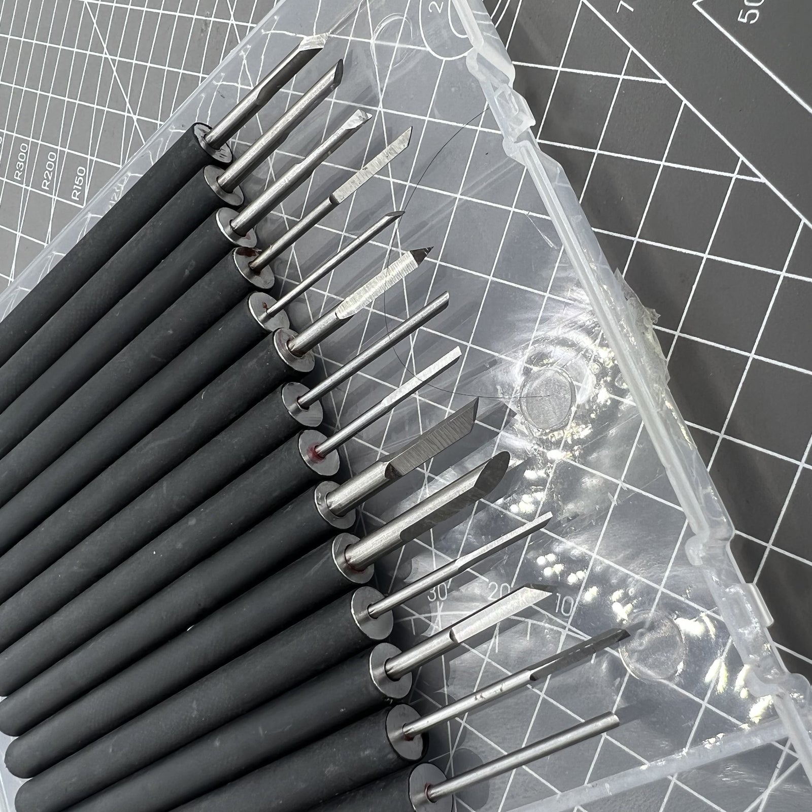 14-piece steel chisel set, ideal for detailed woodworking and miniature carving projects.