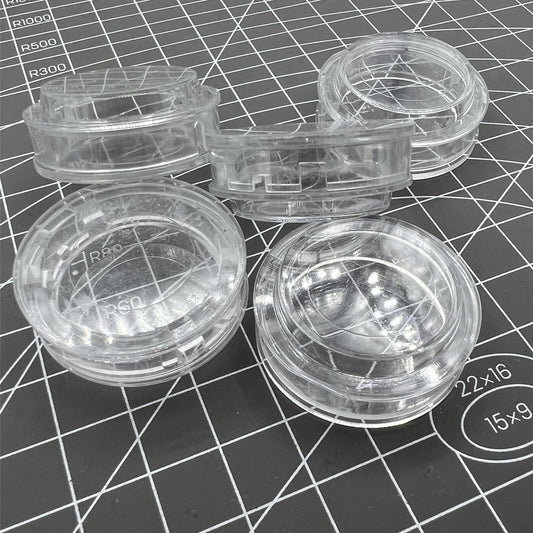 1. Set of 30 small plastic watch movement storage boxes for secure accessory organization.