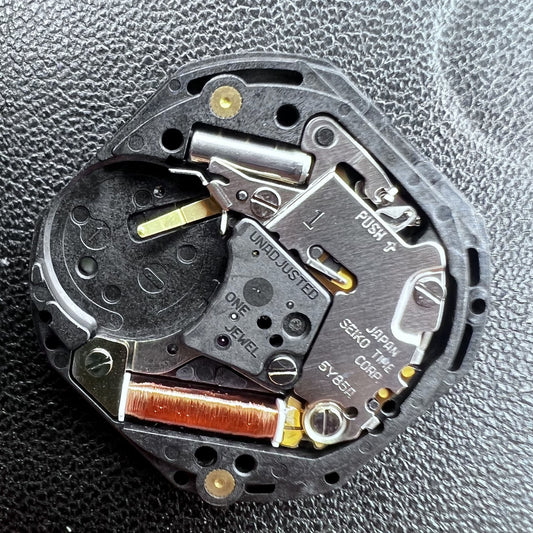 Seiko 5Y85A quartz movement close-up for original Japan watch accessories, precision timekeeping part.