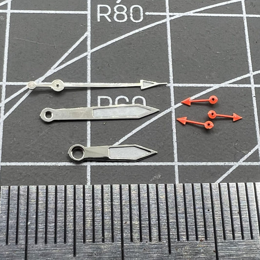 Silver-trimmed green luminous pointed watch hands for Miyota 0S10 movement, precise and stylish accessories.