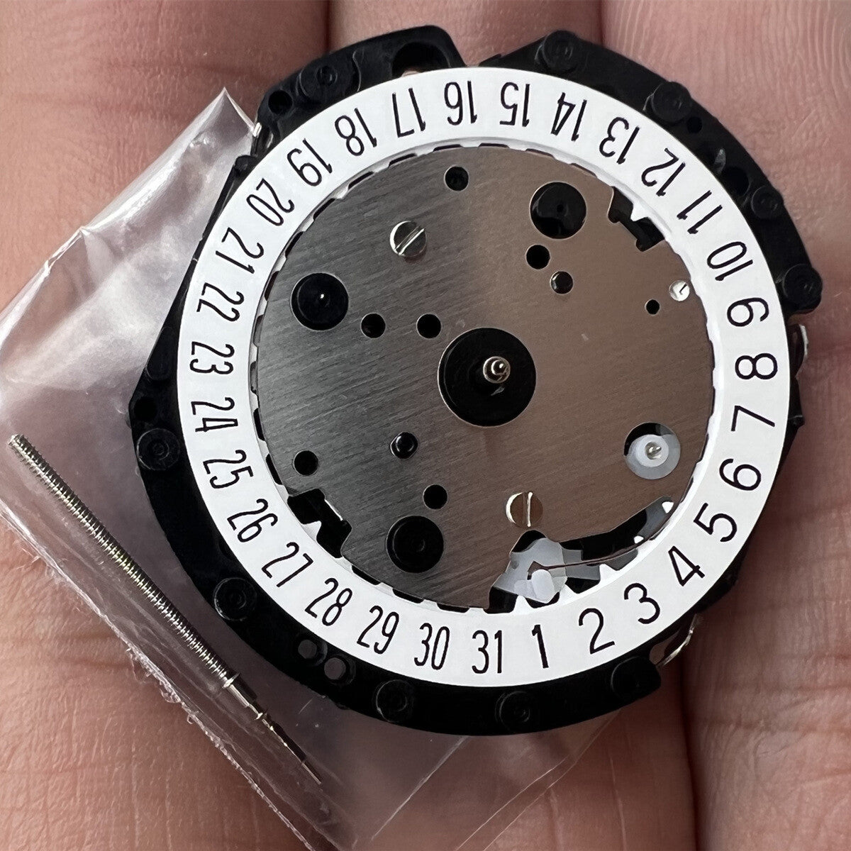 Hattori Epson VD31A quartz watch movement, precision Japanese craftsmanship for timekeeping accuracy.