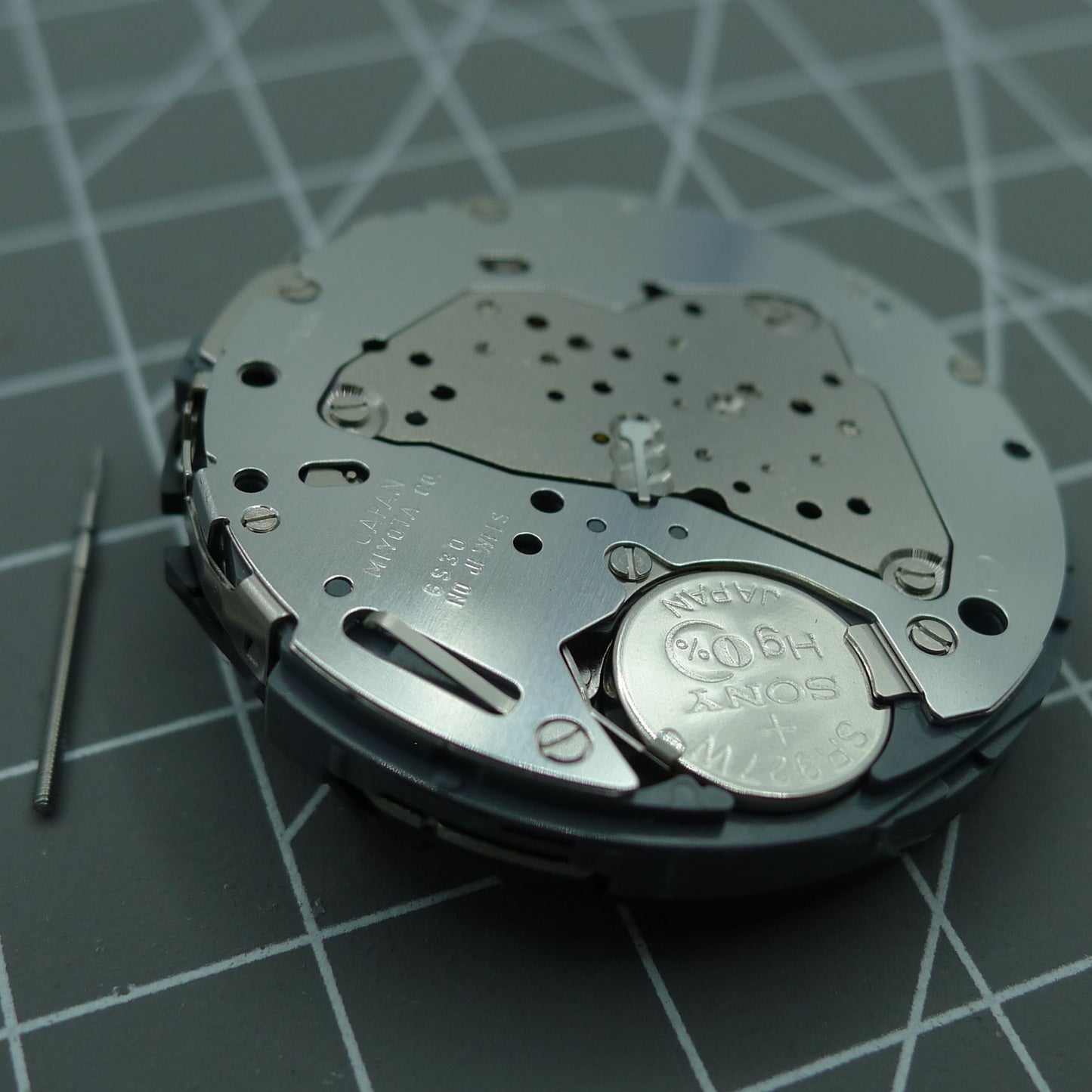 Miyota 6S30 quartz watch movement by Japan Made, featuring date at 4 and subdials at 2, 6, 10 positions for precise timekeeping.