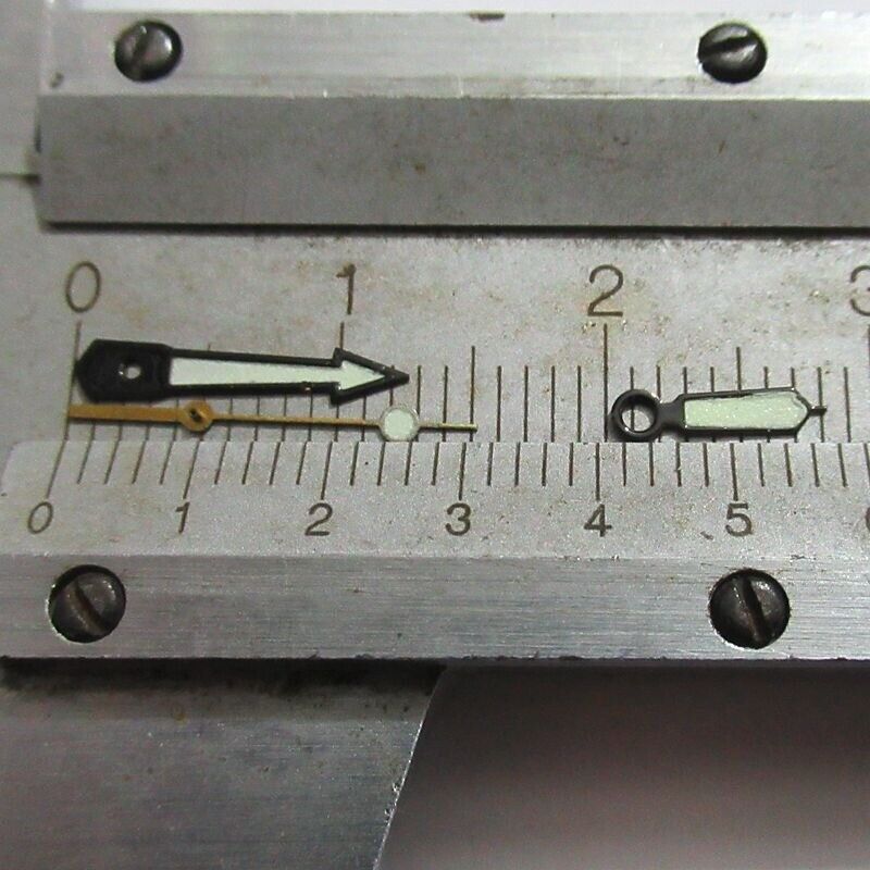 Arrow-shaped green lume watch hands with black trim, compatible with Miyota 2035, 2115, 2105, 2305 movements.