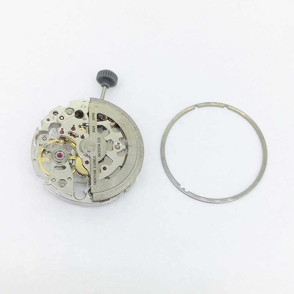 Miyota 8N24 silver automatic skeleton watch movement displaying intricate mechanical gears and craftsmanship by Japan Brand.