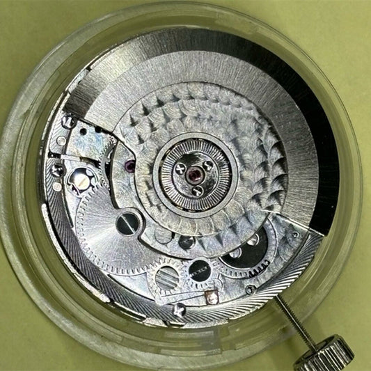 Tianjin Seagull ST25 mechanical watch movement with date at 12, precision China-made component.