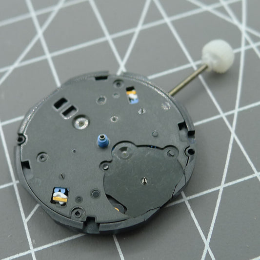 Sunon PE80 quartz watch movement with three hands and small second at 3, 6, and 9 o'clock positions.