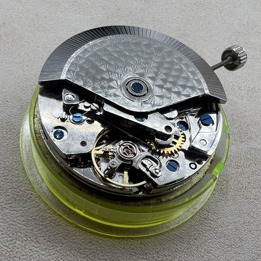 7750 Single Date Chronograph watch with automatic movement and small seconds at 3, 6, and 9, branded.