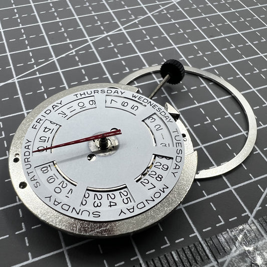 ST2147 automatic watch with mechanical movement, day and week display at 12, date at 3, stylish design.