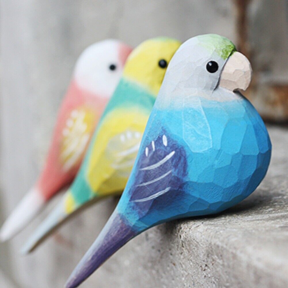 Set of 3 handmade cloud spotted parrot wooden figurines, detailed decorative artwork for home decor.