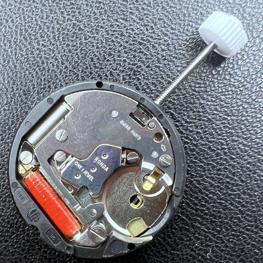 Swiss Ronda 585 quartz watch movement with date display at 6 o'clock, durable and precise.