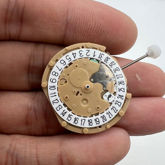 Sunon PE60 quartz watch movement with 3 hands and date at 6 o'clock for precise timekeeping.