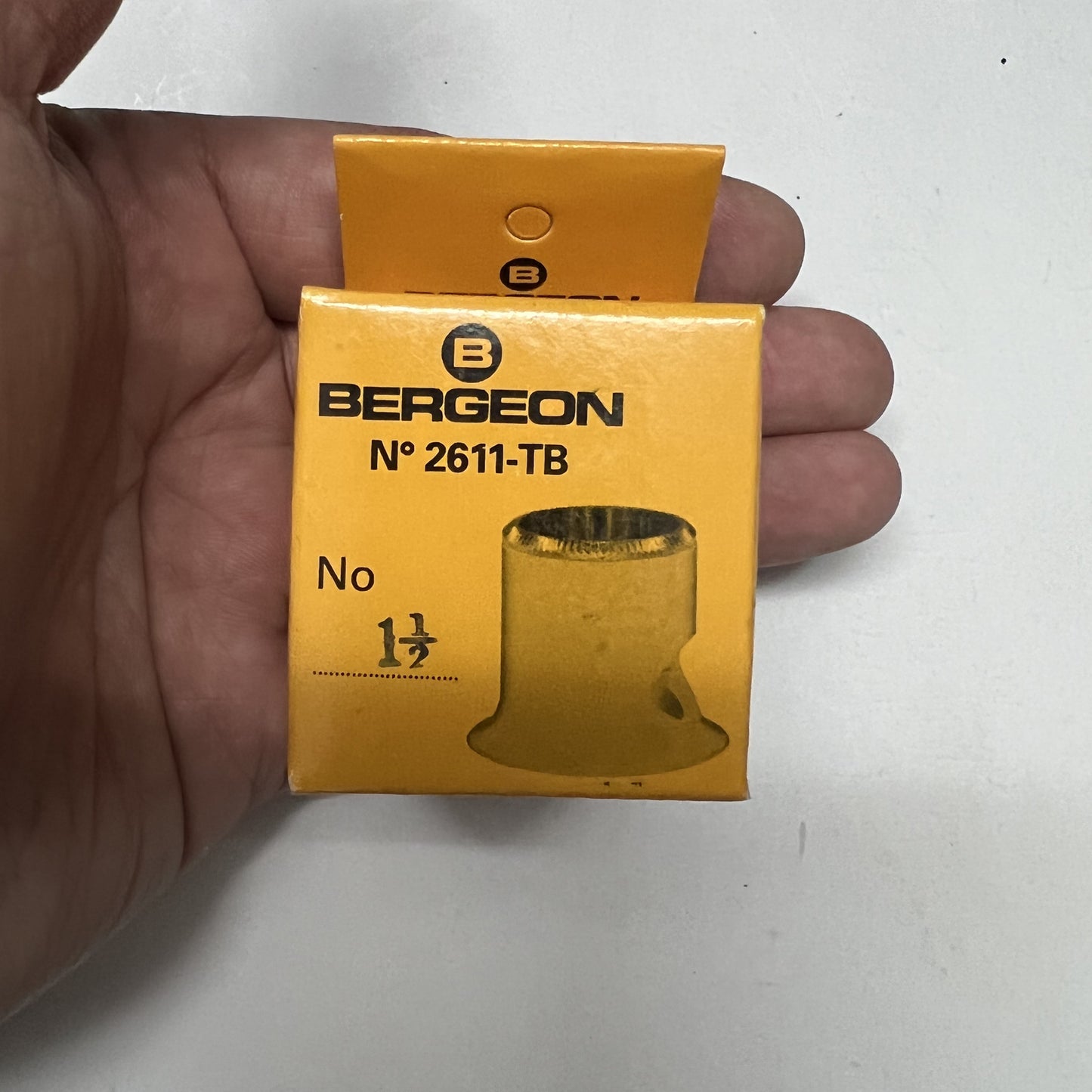 Bergeon 2611-TN jeweler's eye loupe with opening, ideal for detailed watch accessory inspection and precision tasks.