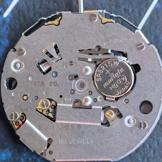 Japan Made Original Miyota JS50 watch movement displaying precise multifunctional quartz timekeeping.