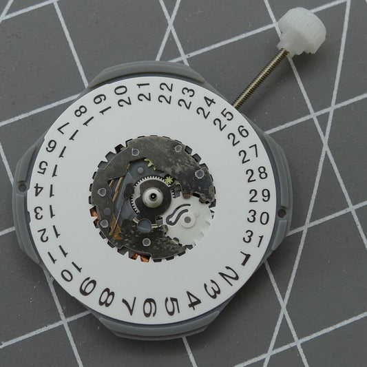1. Sunon PE27 quartz watch movement showing three hands and date display for precise timekeeping.