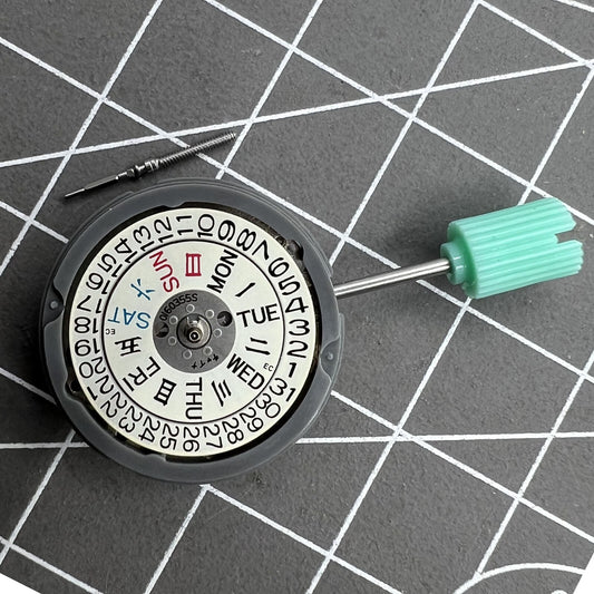 NH06A watch movement showcasing double calendar date at 3 o'clock, precision Japan-made mechanism.