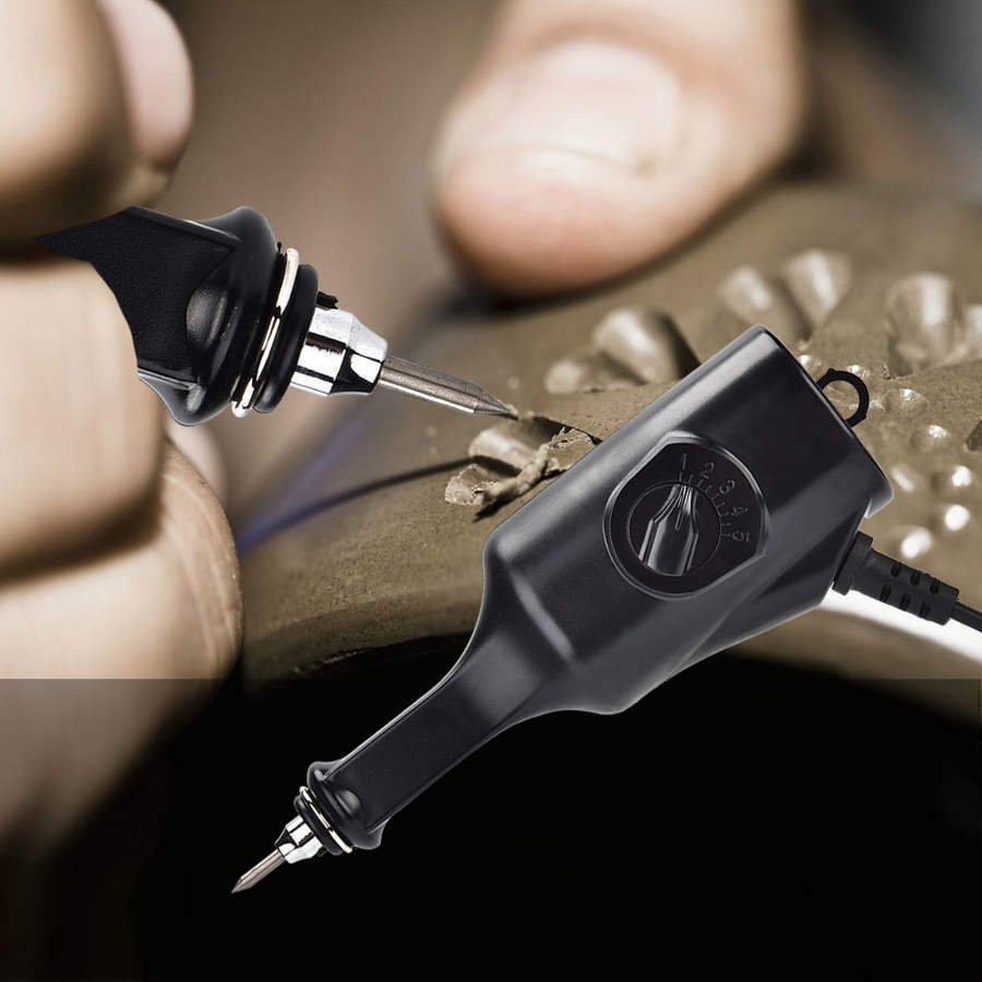 Electric jewelry engraver carving pen for precise lettering and intricate designs on jewelry.