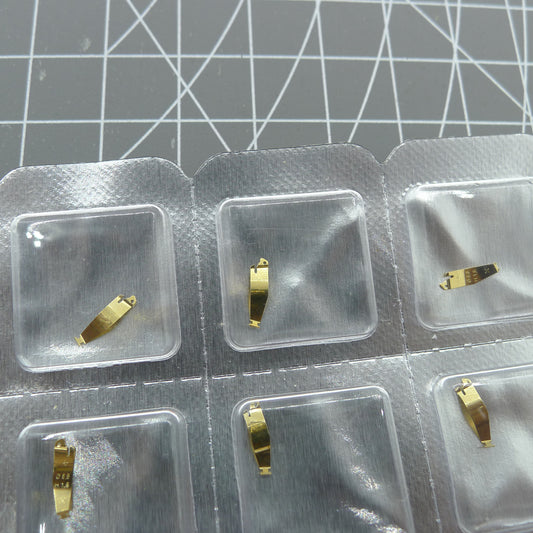 Set of 3 ETA brand battery fixing plates for quartz watch movements, precise and durable fit.