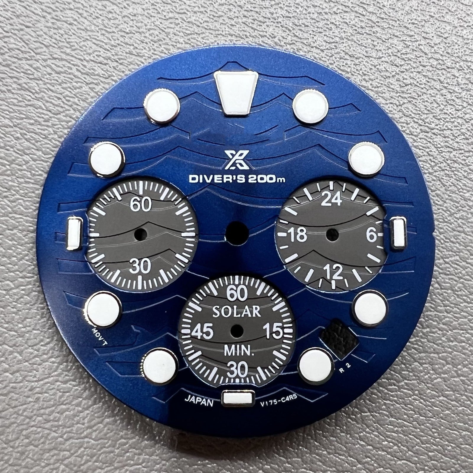 Green luminous watch dial with 31mm silver trim for VD53 movement, perfect for watch repairs.