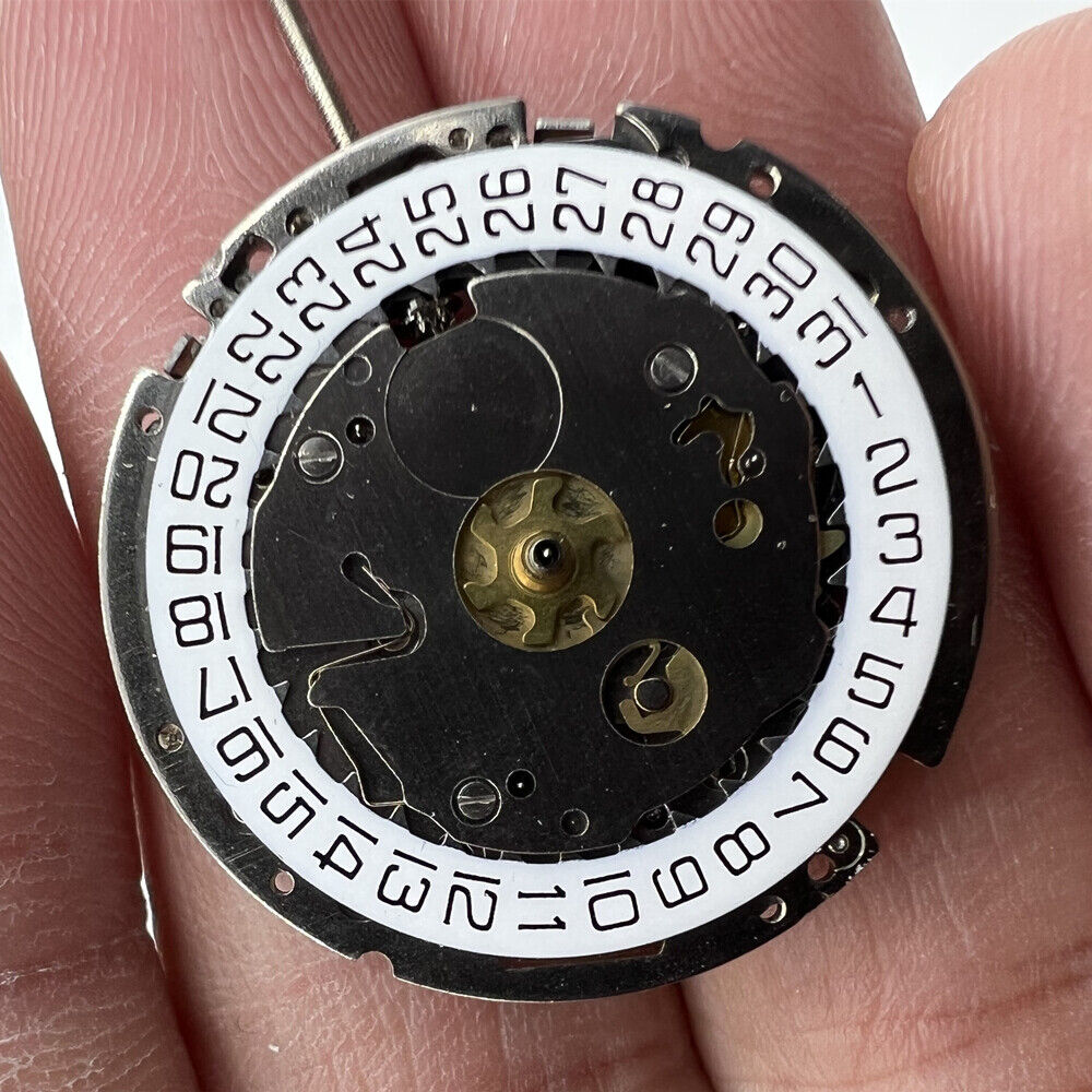 Genuine Swiss ISA 8161 silver quartz watch movement with date display at 4, perfect for repairs and replacements.