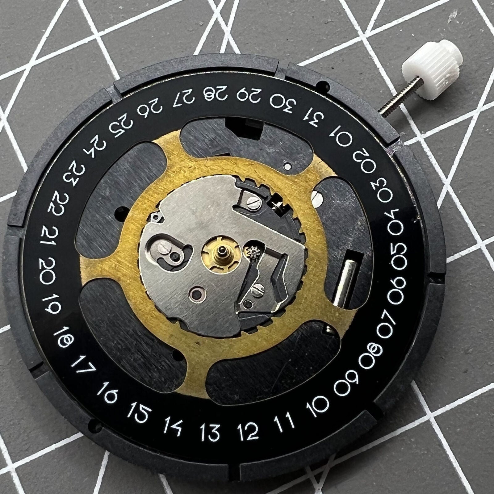 Black dial quartz watch movement replacement ISA 2334/1035 for precise timekeeping by ISA.