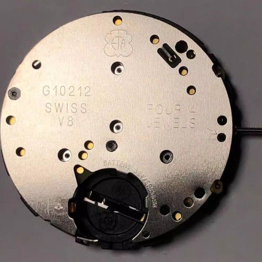 Swiss White ETA G10.212 quartz watch movement with 3 hands and slanted date at 4 o?clock for precise timekeeping.