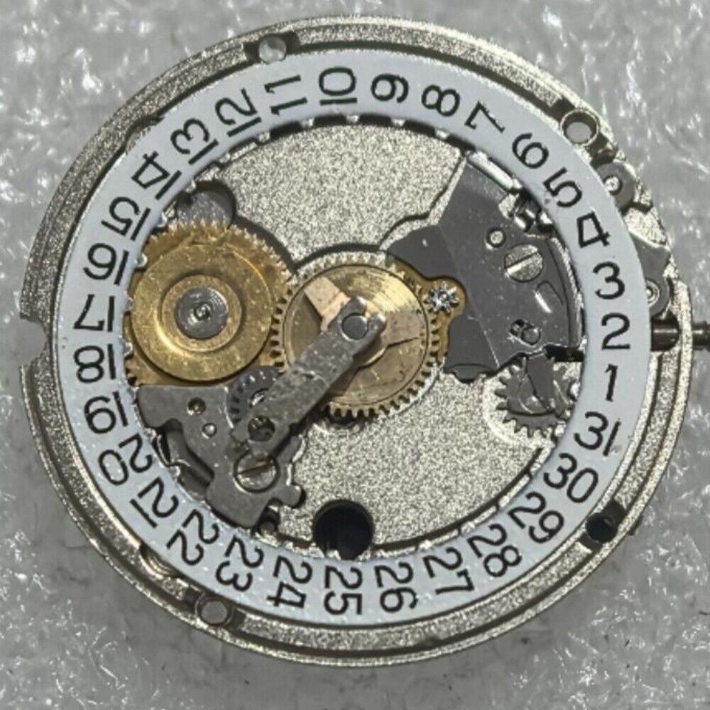 Swiss Made ETA556.115 quartz movement with 2 hands and date, ideal for precise watch repair and replacement.