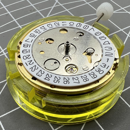 DG2813 automatic golden mechanical watch movement showcasing date function, ideal for precise replacements.