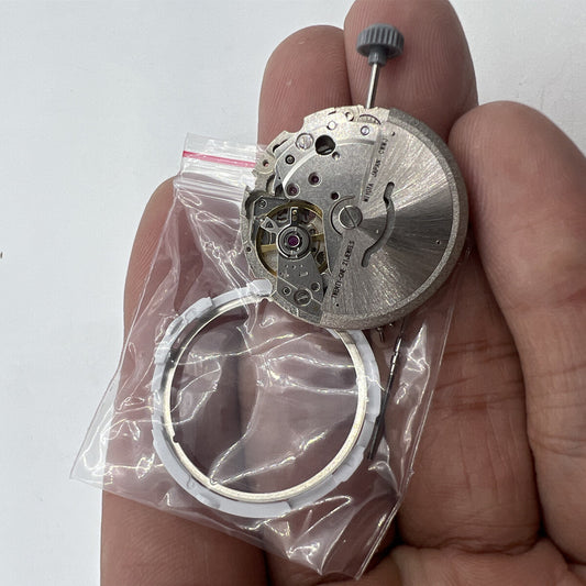 Close-up of Genuine Japan Silver Miyota Citizen Men?s 8200 8215 automatic mechanical watch movement details.