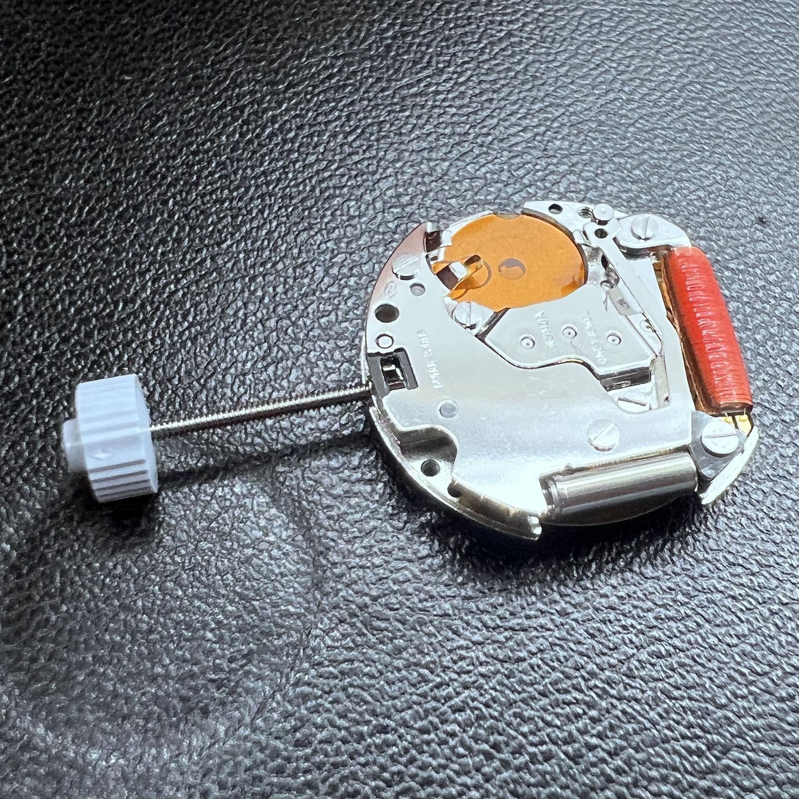 Swiss Ronda 775 quartz watch movement with date display at 6 o'clock, precise and reliable by Ronda.