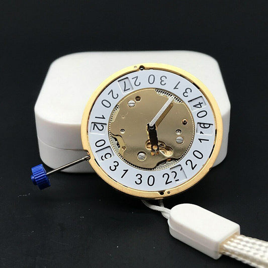 Golden 10 Jewels Ronda Quartz watch movement by 5020.B, Swiss made for precise timekeeping.