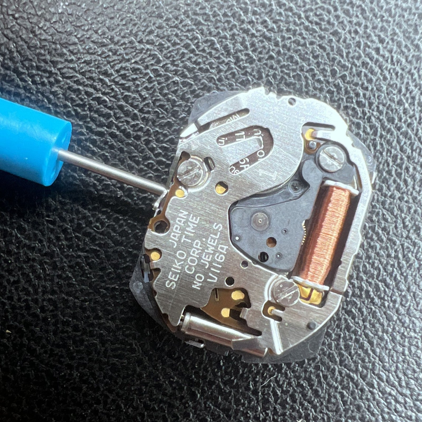 Original Japan Seiko V116A quartz watch movement for precise timekeeping in watch accessories.