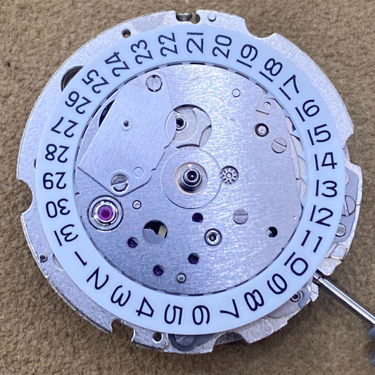 Japan Made Miyota 8217 automatic watch movement with 3 hands and small second at 9 by Miyota.