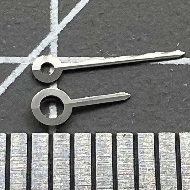 Black 2-hand set for Ronda 751 quartz watch movement, sleek and precise timekeeping accessory.